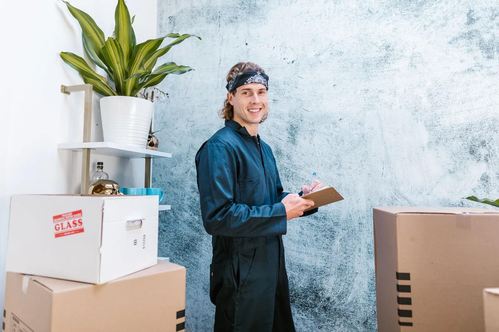 A seller checking off a GPSR compliance checklist next to packaged products.